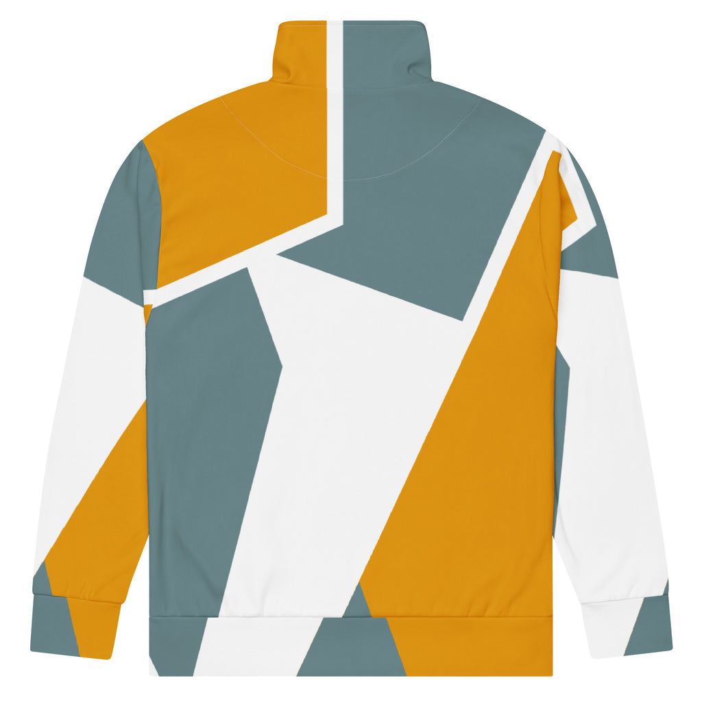 Trainingsjacke mit einem abstrakten, geometrischen Muster in den Farben Gelb, Grau und Weiß. Die Jacke hat einen Stehkragen und einen durchgehenden Reißverschluss.