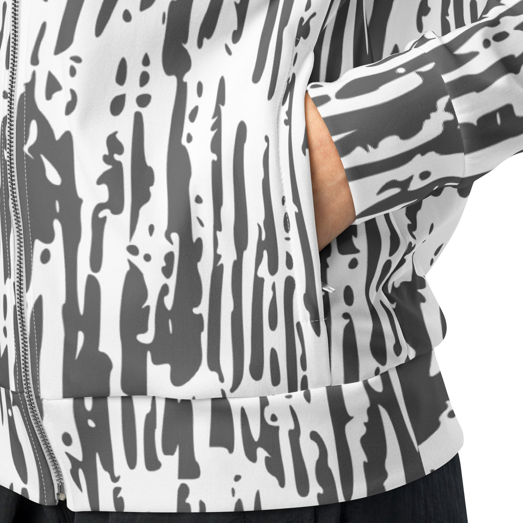 Einzigartige Trainingsjacke mit markantem Schwarz-Weiß Strichmuster. Komfortabel und stilvoll für ausdrucksstarke Streetwear-Looks. 