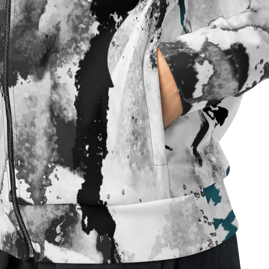 Herren-Trainingsjacke mit einem Inkstorm Muster in Schwarz, Grau, Türkis und Weiß. Die Jacke hat einen Stehkragen und einen durchgehenden Reißverschluss.