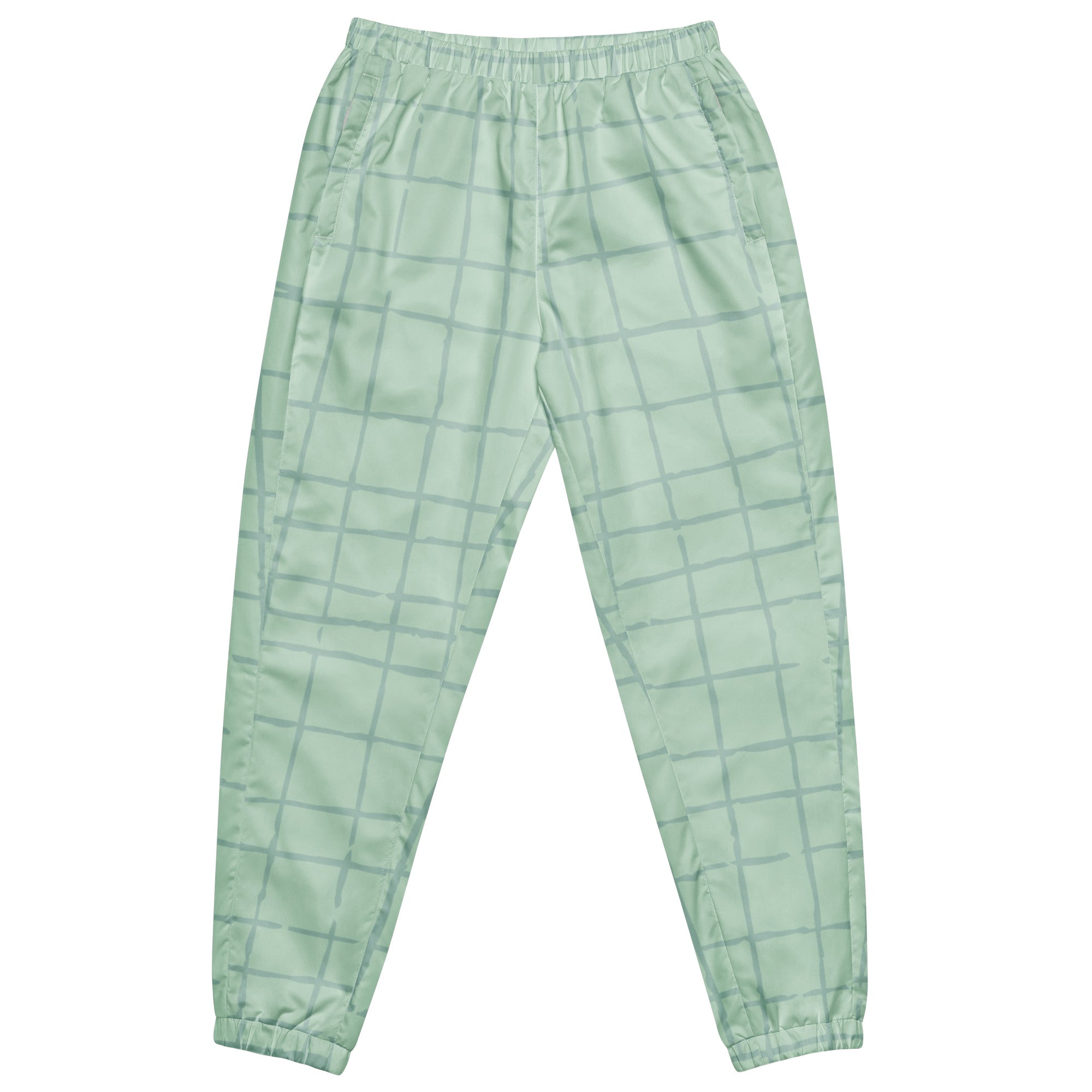 Trainingshose in hellem Mintgrün mit einem dezenten, hellgrauen Gittermuster. Die Hose hat einen elastischen Bund und Bündchen an den Beinabschlüssen.