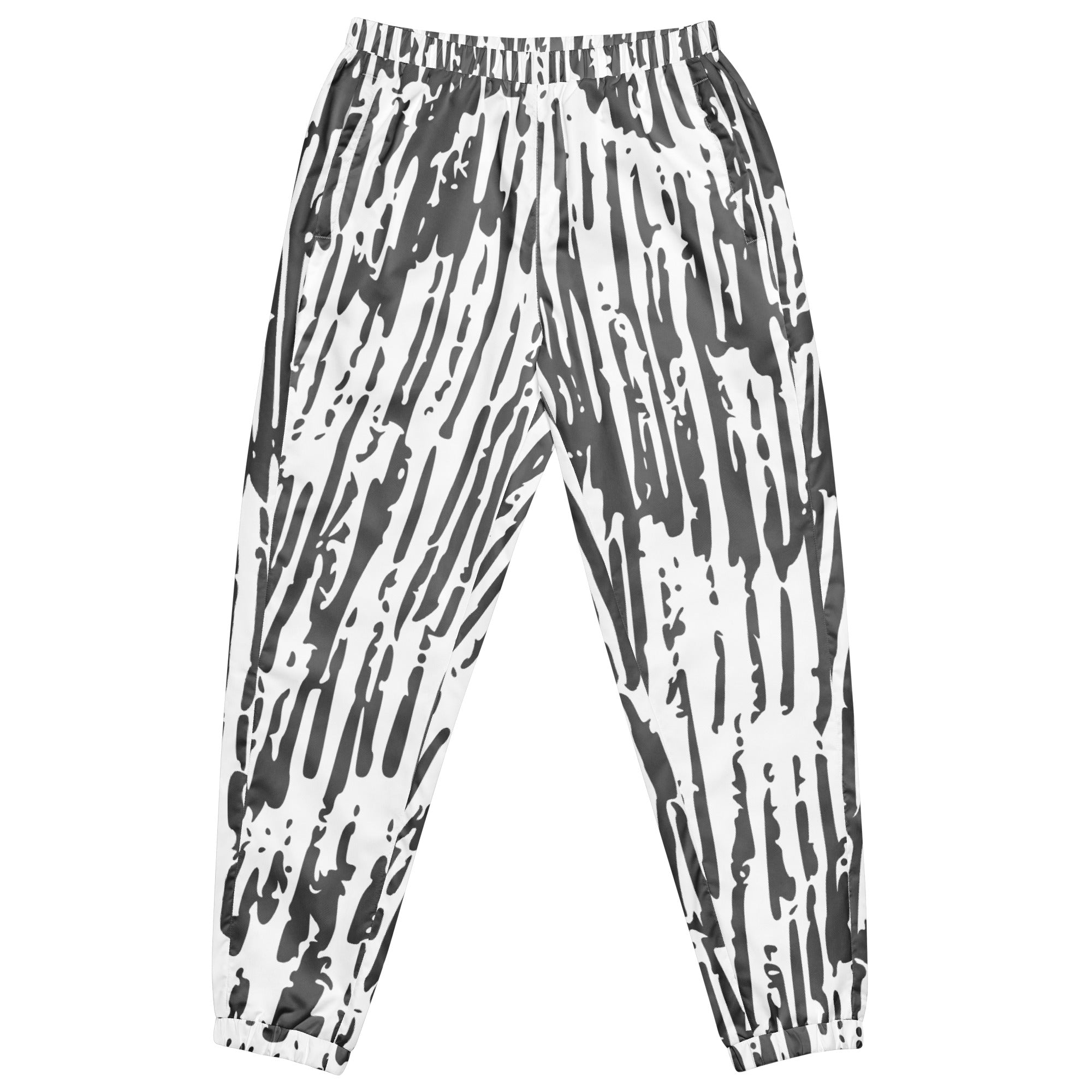 Schwarz-weiße Trainingshose mit einem abstrakten, vertikalen Strichmuster. Die Hose hat einen elastischen Bund und Bündchen an den Beinabschlüssen.