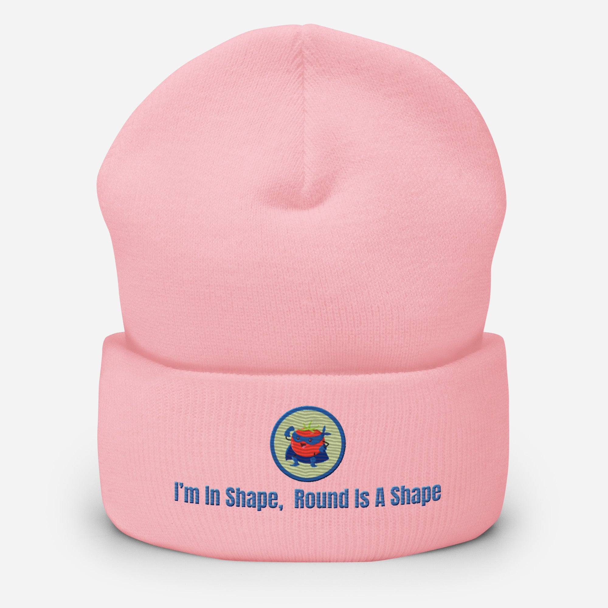 Ein Baby rosanes Cuffed Beanie mit einem aufgesticktem Patch eines Tomaten Superhleden (Cartoon) in einem Runden blau-salbeigrünem Rahmen sowie einen schlichten Schriftzug darunter der lautet: "I´m in Shape, Round is A Shape!" auf der Vorderseite. Designed, by Just a Girl.