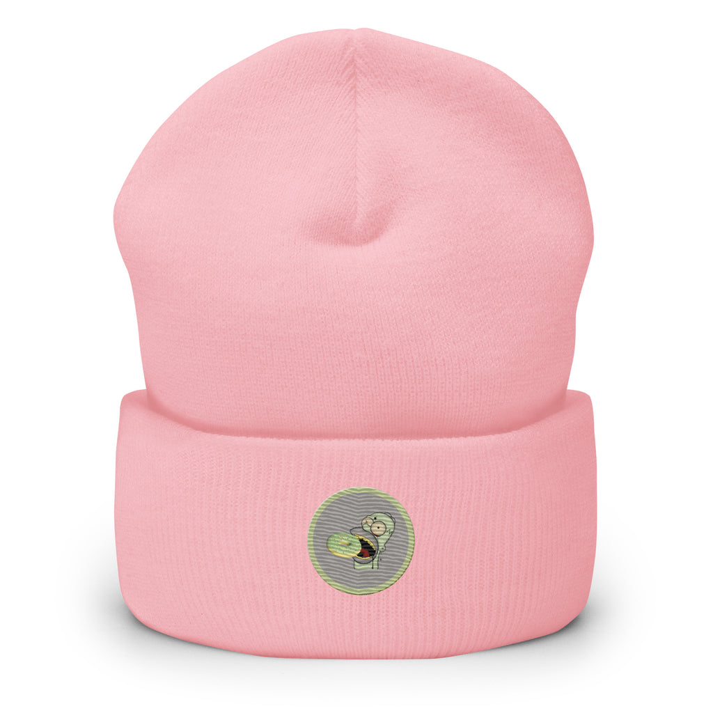 Ein Babyrosa farbenes Cuffed Beanie mit aufgesticktem Homer Monster Gesicht und einem Donut in einem hellgrauen-salbeigrünem Rahmen auf der Vorderseite. Designed, by Just a Girl.