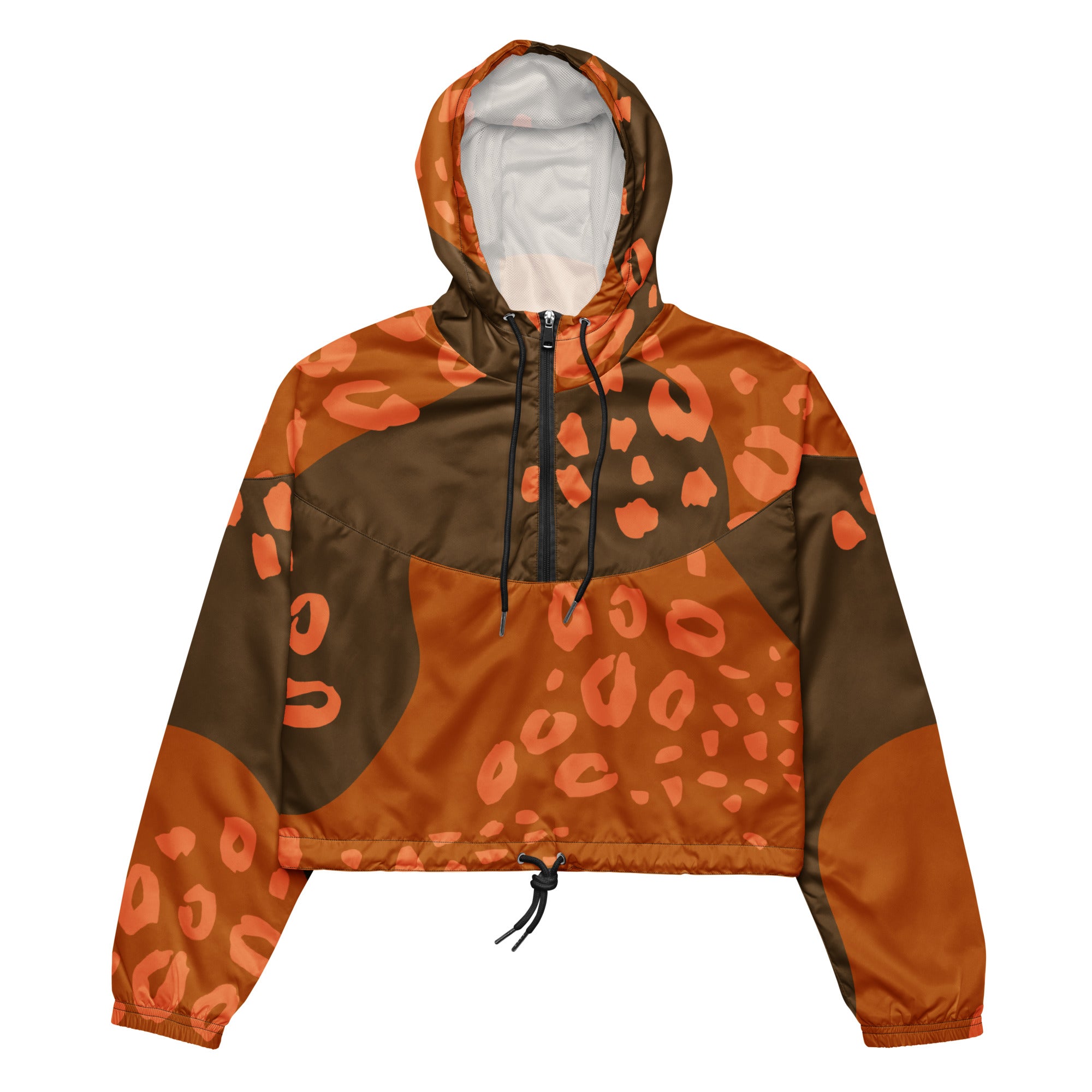 Ein Damen Cropped Windbreaker in Dunkelbraun und Orange mit einem abstrakten Muster aus unregelmäßigen Flecken und Formen, teilweise leopardenähnlich. Die Jacke hat eine Kapuze, einen halben Reißverschluss, schwarze Kordeln und einen verstellbaren Saum. mockup voderansicht. By Just a Girl.
