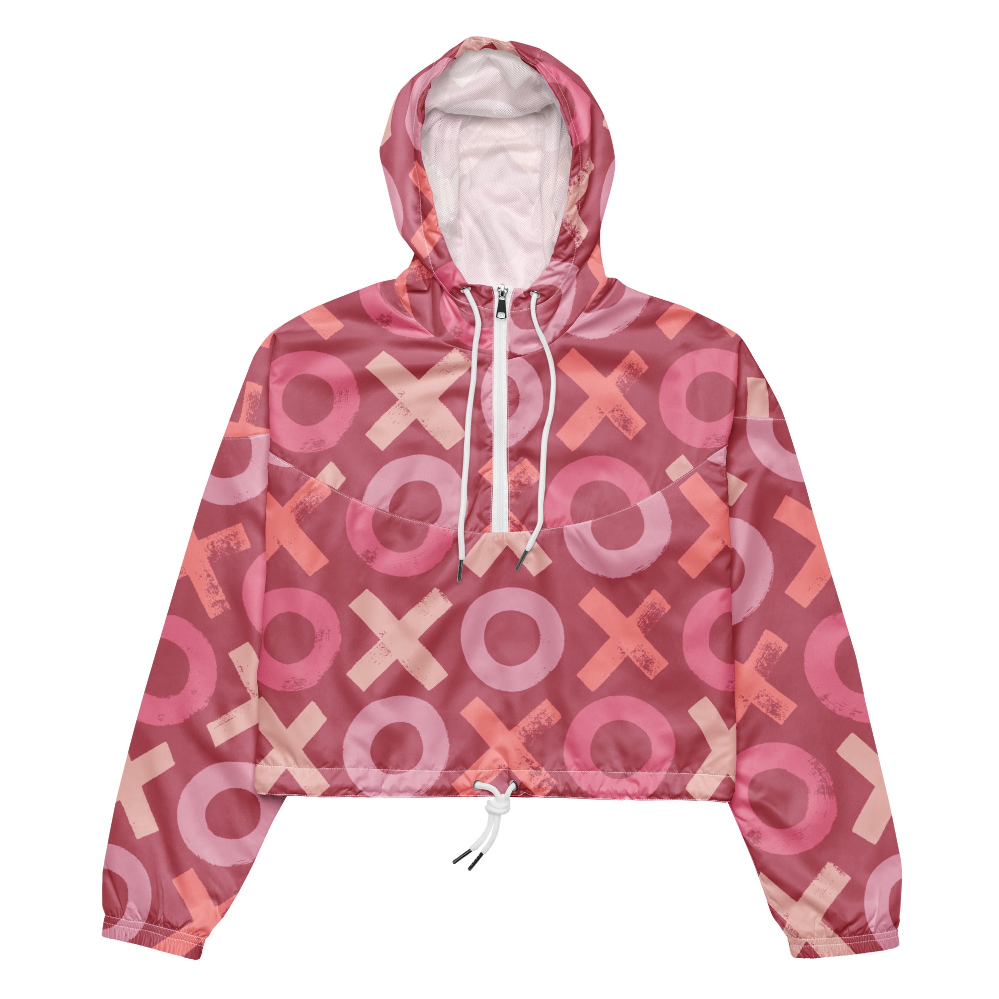 Ein Damen Cropped Windbreaker in verschiedenen Rosa- und Rottönen mit einem durchgängigen Muster aus großen X- und O-Formen. Die Jacke hat eine Kapuze, einen halben Reißverschluss, weiße Kordeln und einen verstellbaren Saum. by Just a Girl


