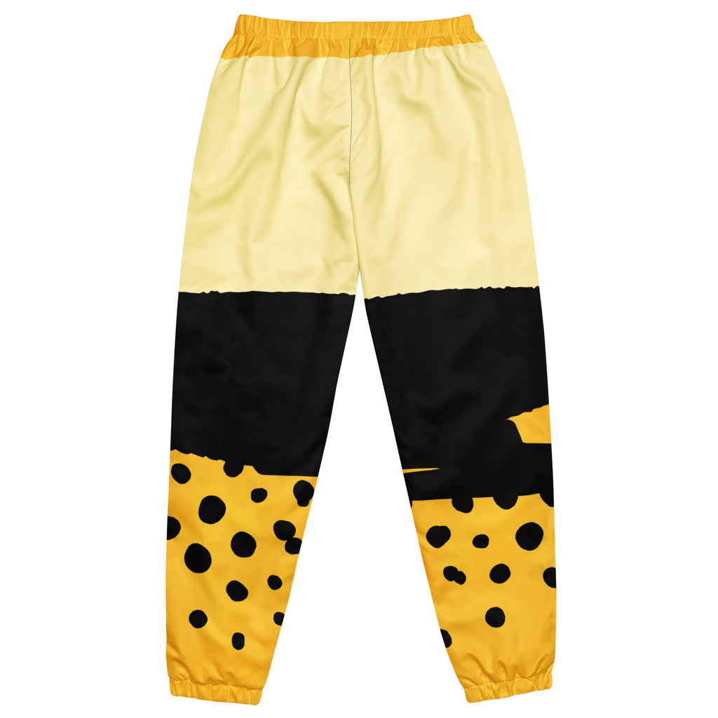 Damen Trainingshose in Gelb, Schwarz und einem pastell gelb, mit einem auffälligen schwarzen Punktemuster auf der unteren gelben Hälfte, mockup Hosenansicht hinten. By Just a Girl.