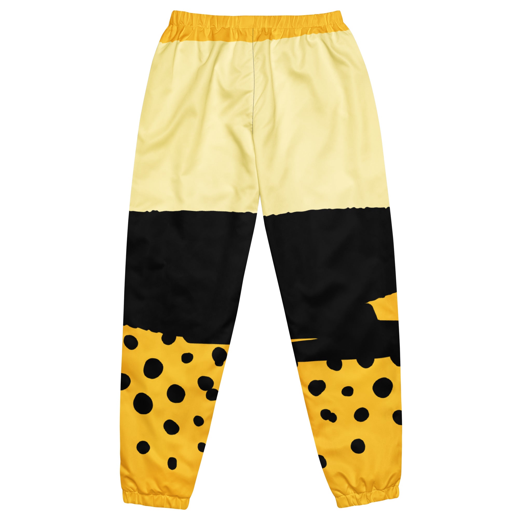 Damen Trainingshose in Gelb, Schwarz und einem pastell gelb, mit einem auffälligen schwarzen Punktemuster auf der unteren gelben Hälfte, mockup Hosenansicht hinten. By Just a Girl.