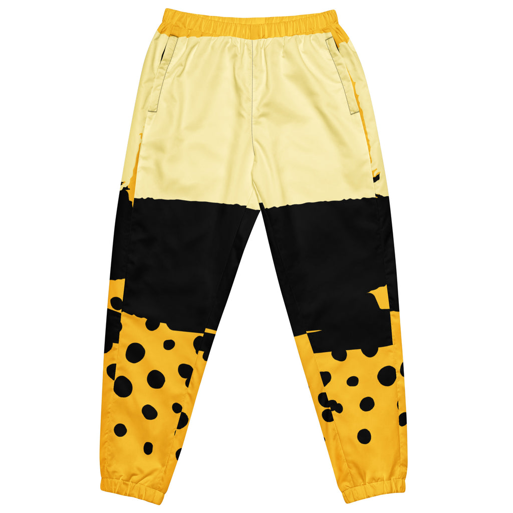 Damen Trainingshose in Gelb, Schwarz und einem pastell gelb, mit einem auffälligen schwarzen Punktemuster auf der unteren gelben Hälfte, mockup Hosenansicht vorne. By Just a Girl.