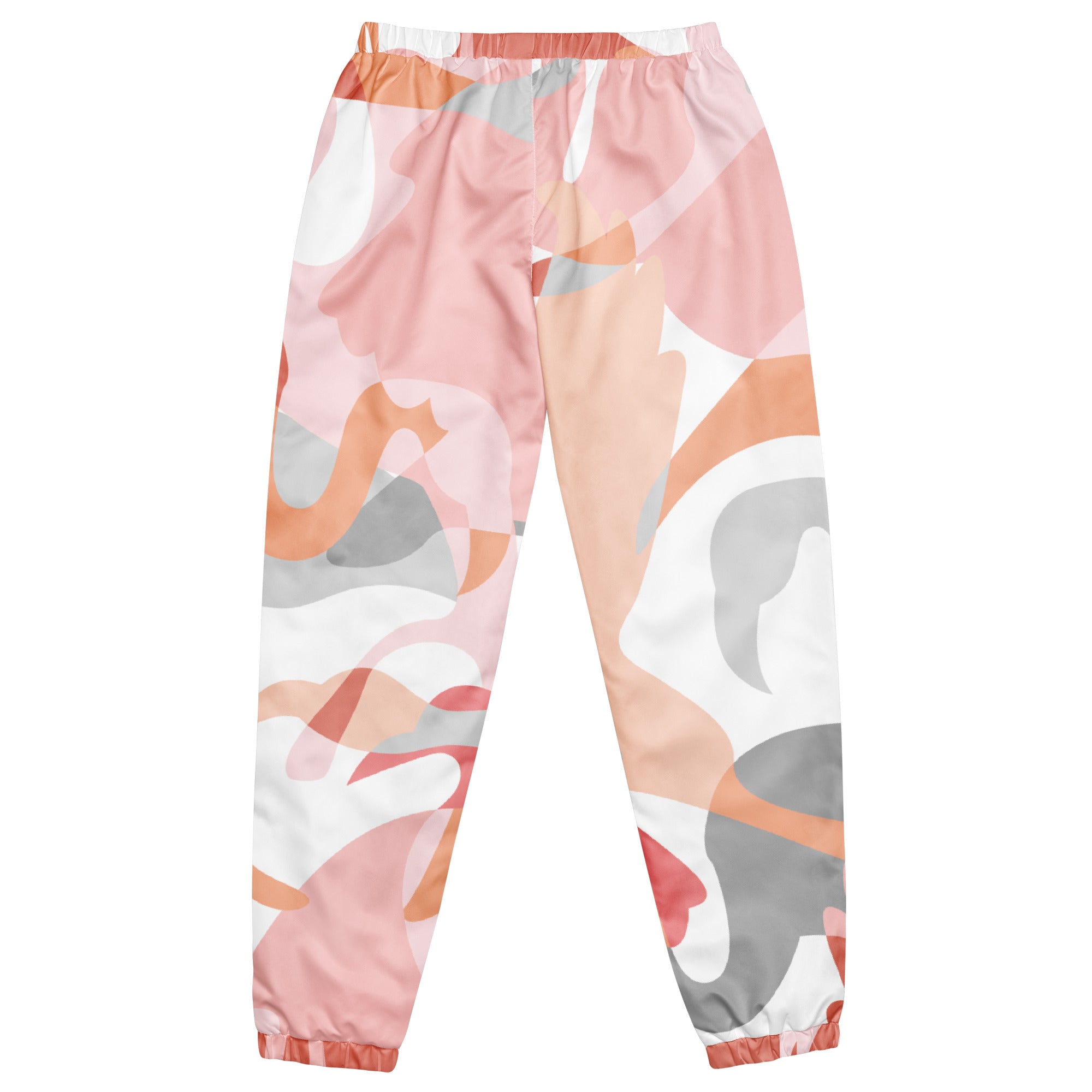 Eine Damen Trainingshose mit einem abstrakten Muster in Rosa-, Orange-, Grau- und Weißtönen, das an schmelzende Formen oder Flüssigkeiten erinnert. Die Hose ist flach ausgebreitet und zeigt Gummizug, Kordelzug und Bündchen an den Knöcheln.