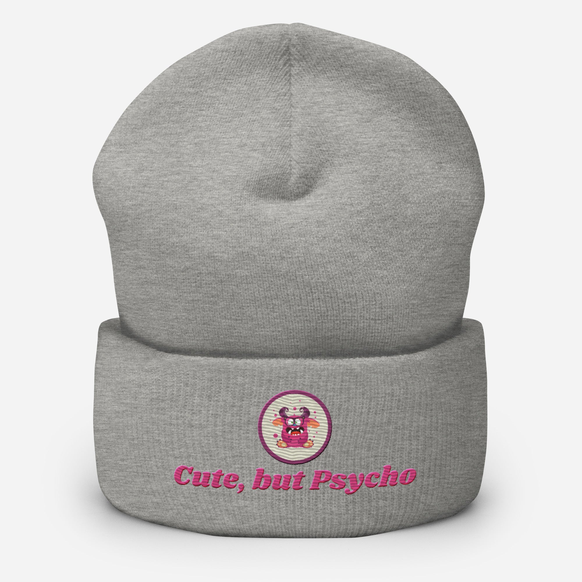 Eine Heather Graue Cuffed Beanie mit aufgesticktem pinken monster gesicht in einem runden lila Rahmen auf der Vorderseite und "Cute but Psycho" Schrift darunter. Designed, by Just a Girl.