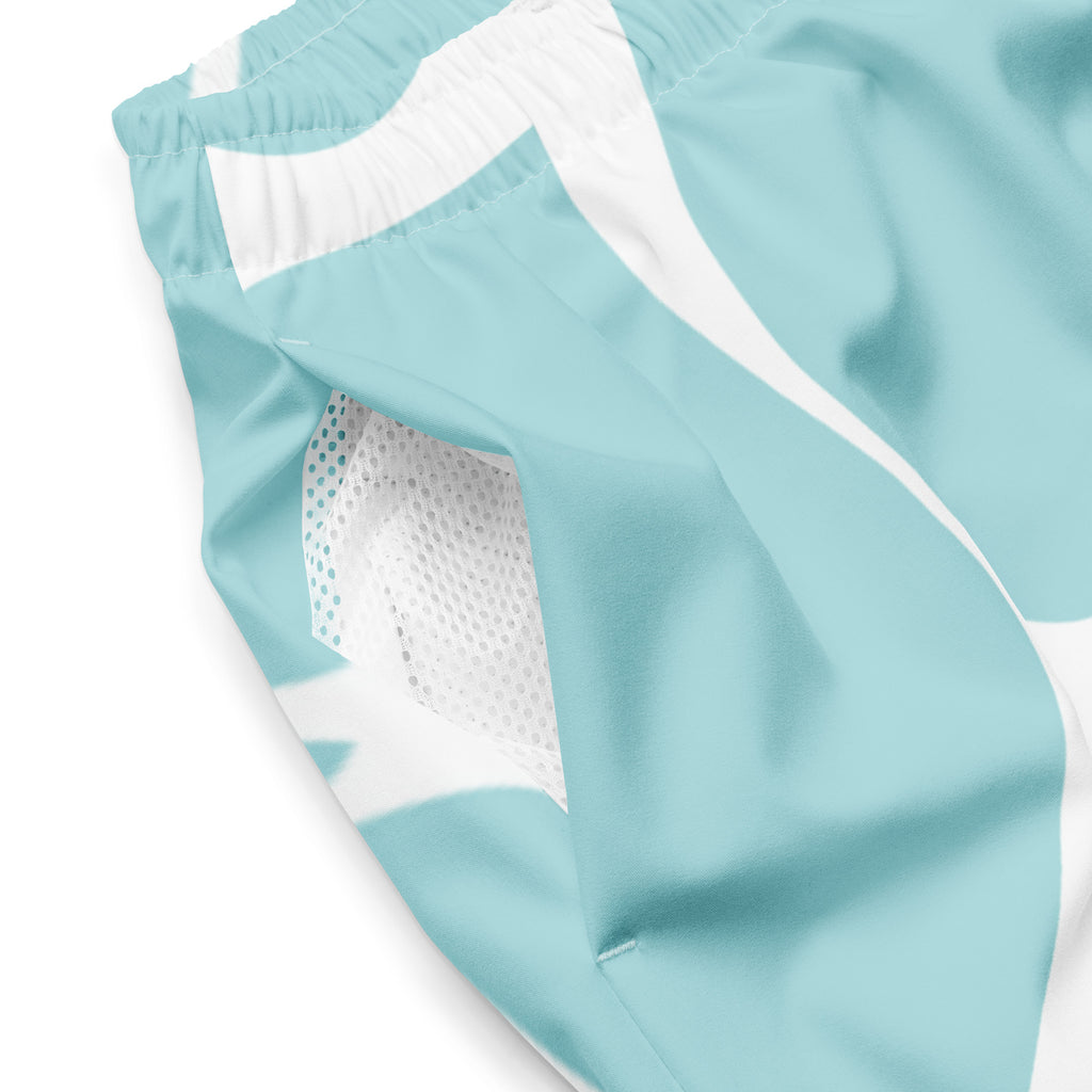 Eine Badeshorts in einem hellen Türkis oder Aquablau mit einem organischen, netzartigen Muster aus dicken, unregelmäßigen weißen Linien, die an ein abstraktes Mosaik oder eine Zellstruktur erinnern. Der Bund ist elastisch und weiß.
