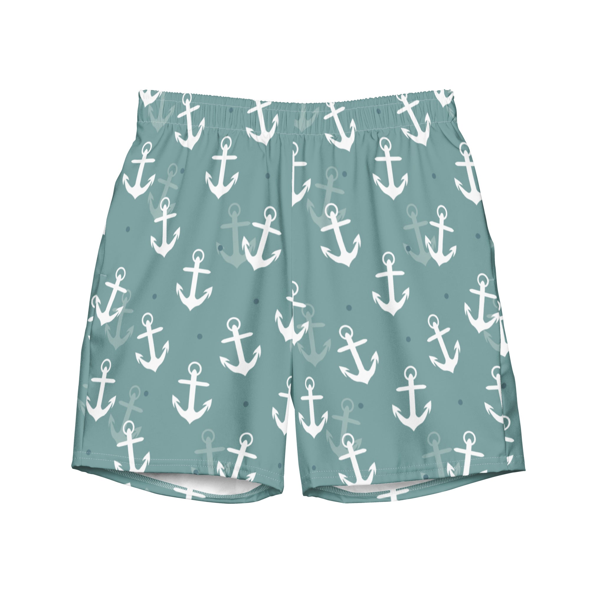 Eine Badeshorts in einem gedeckten Türkis- oder Blauton mit einem wiederkehrenden Muster aus weißen und hellgrauen Ankern und kleinen blauen Punkten. Der Bund ist elastisch und farblich passend.