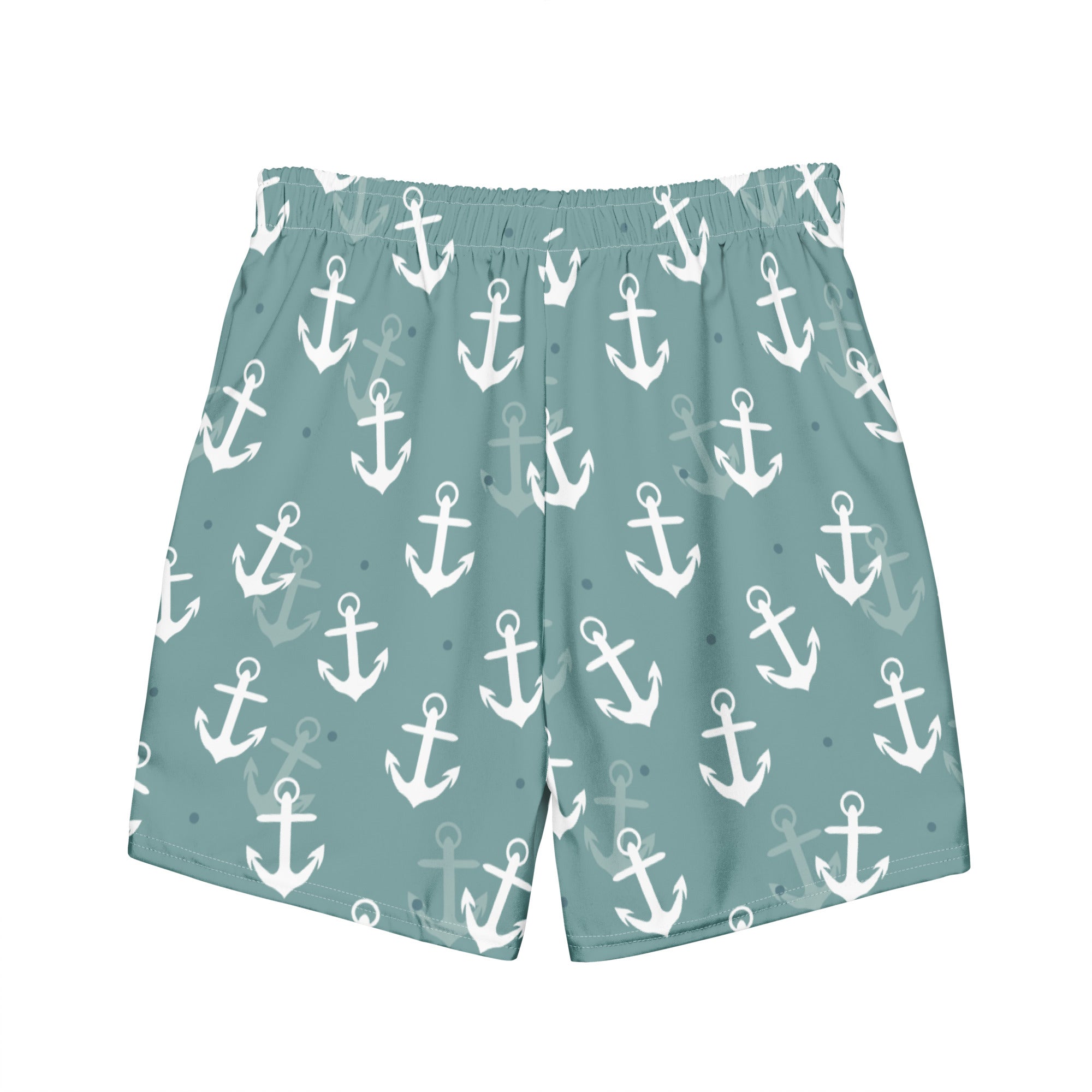 Eine Badeshorts in einem gedeckten Türkis- oder Blauton mit einem wiederkehrenden Muster aus weißen und hellgrauen Ankern und kleinen blauen Punkten. Der Bund ist elastisch und farblich passend.