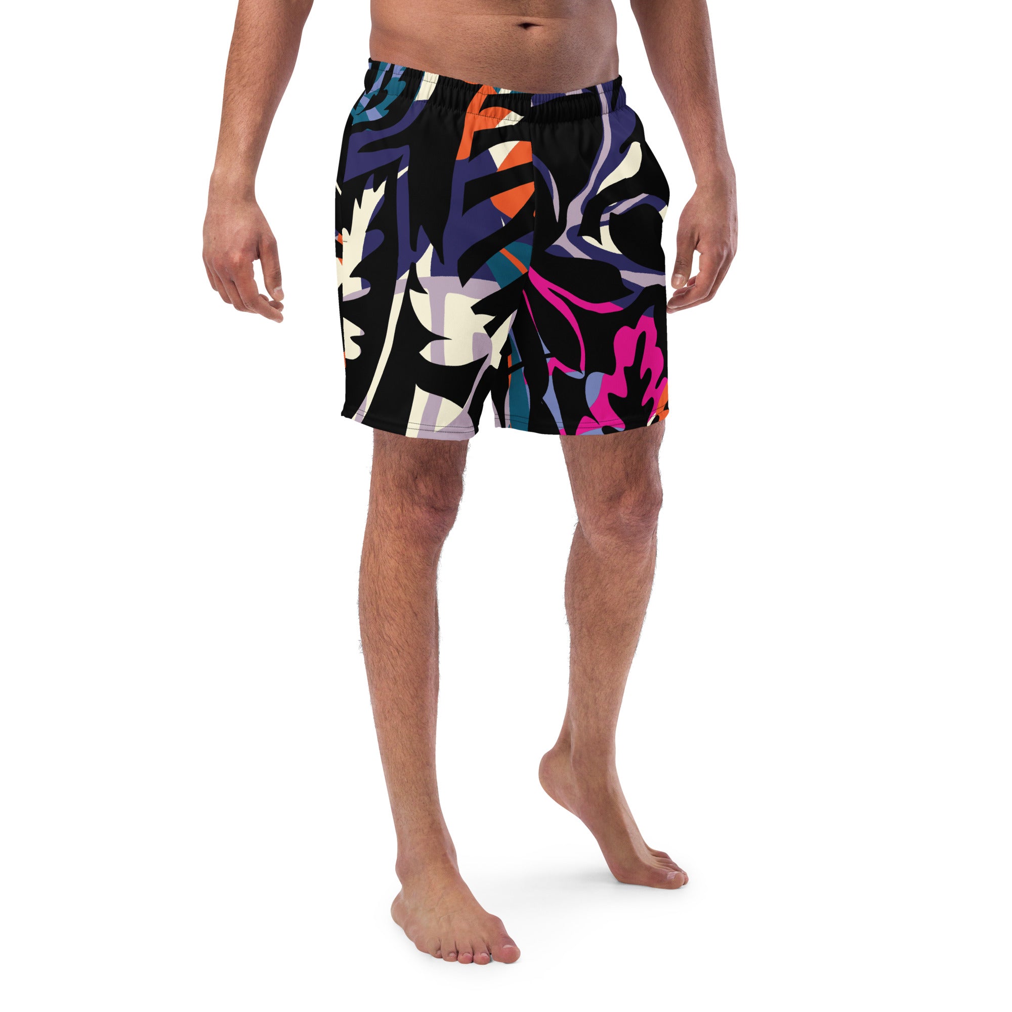 Eine Badeshorts mit einem abstrakten und lebhaften Muster aus stilisierten Blättern und Formen in leuchtenden Farben wie Violett, Orange, Türkis, Pink und Hellblau auf schwarzem Hintergrund. Der Bund der Shorts ist elastisch und schwarz.