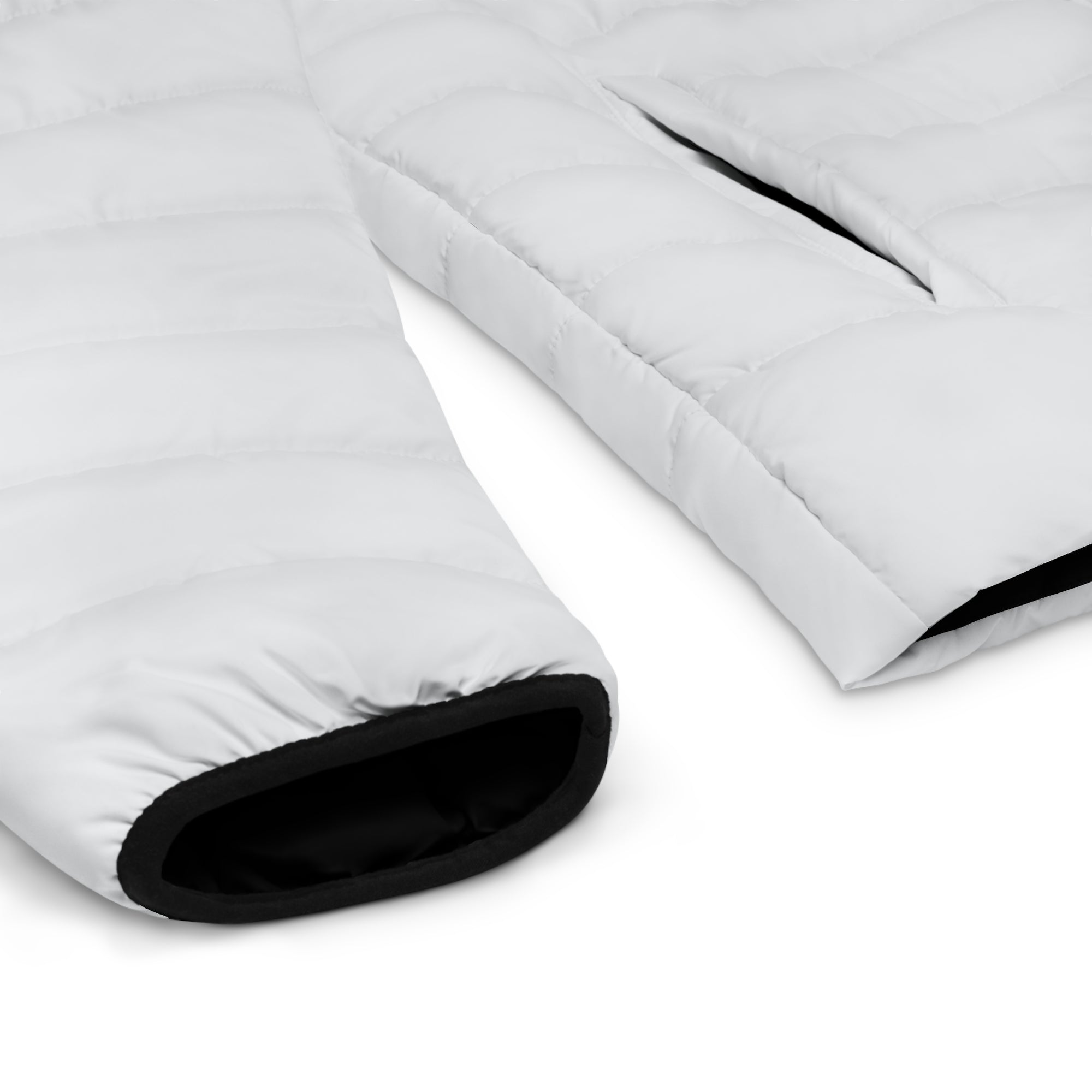 Eine freigestellte, schwebende Herren-Pufferjacke mit der Ansicht eines Ärmels und den dazugehörigen Saumabschluss der Schwarz ist. Designed, by Just a Girl

