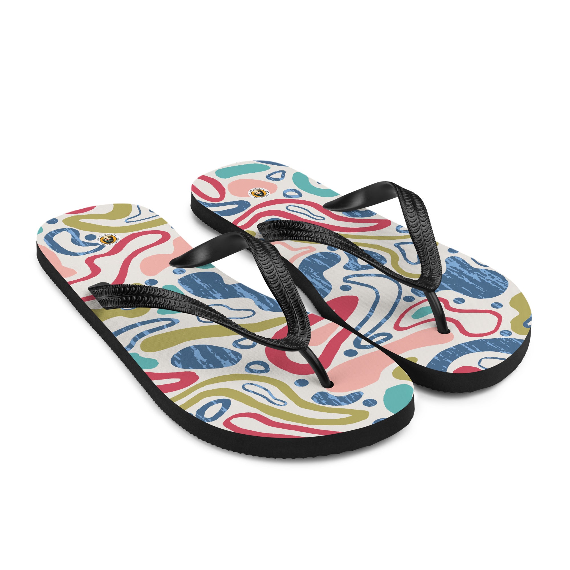 Ein Paar schwarze Herren-Flip-Flops mit einem Obermaterial, das ein lebhaftes, abstraktes und fließendes Muster auf einem hellen Hintergrund zeigt. Das Muster besteht aus geschwungenen Linien und organischen Formen in verschiedenen Farben wie Rot, Blau, Rosa, Olivgrün und Türkis. Die Riemen sind schwarz und haben eine strukturierte Oberfläche.