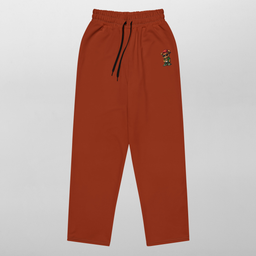 Freigestellte Jogginghose in "kupfer rot", gerade geschnitten mit elastischem Bund und Frontprint – minimalistisches Streetwear-Design.