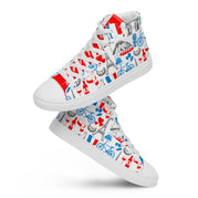 Ein Paar schwebende High-Top Canvas Schuhe für Damen, bedruckt mit einem bunten Muster aus Pariser Motiven wie dem Eiffelturm und Fahrrädern. Die linke Schuhzunge ist rot mit einem weißen Schriftzug "Bon vivant", die rechte ist blau mit dem weißen Schriftzug "Paris". Die Schuhsohle, Fusskappe und Schnürsenkel sind weiß. Designed, by Just a Girl